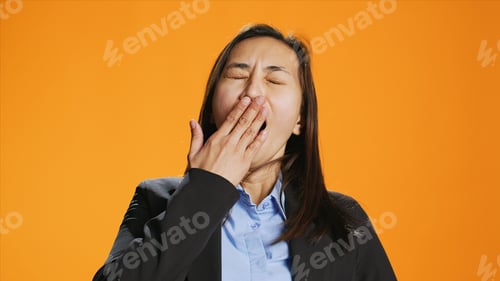 Preview: Exhausted person in formal clothes yawning