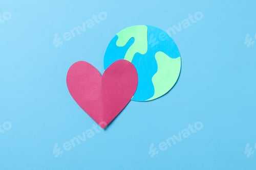 Preview: Globe and red heart shape. Global healthcare and Green Earth day.