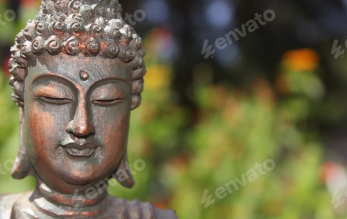 Preview: Buddha Statue in Outdoor Garden With Blurred Background