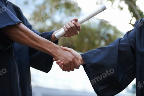 Preview: Its the key to her future. Cropped shot of a graduate receiving a degree.