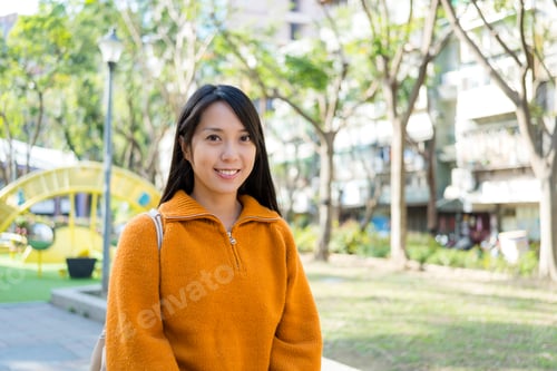 Preview: Asian woman in the park