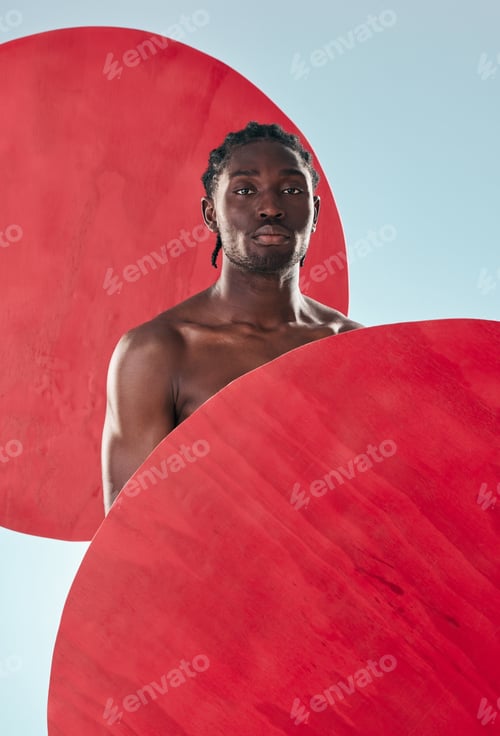 Preview: Portrait, black man and muscle with creativity, fitness and artistic on a blue studio background. F