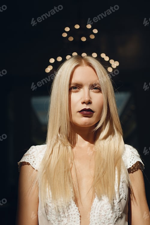 Preview: Portrait of a beautiful fashion bride in contrast sunlight