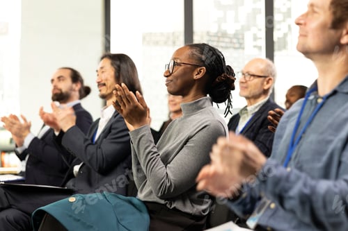 Preview: Business event in conference room with audience clapping hands