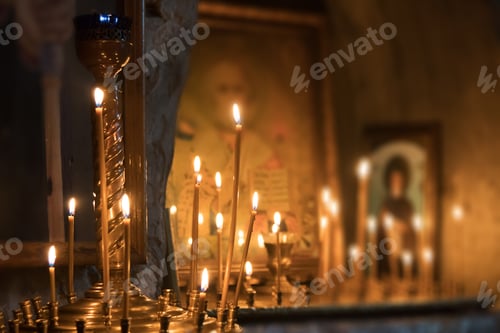 Preview: Icons and burning candles in the church