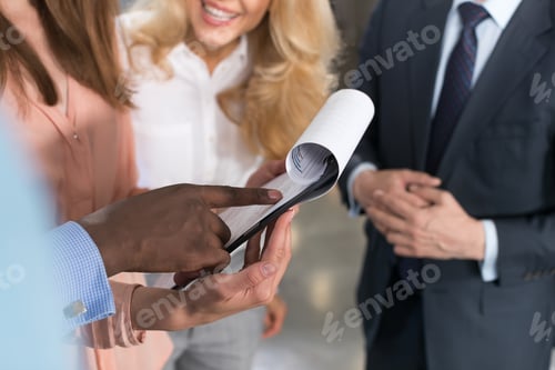 Preview: Business People Reading Documents, Partners Discussing Contract Paper File In Modern Office Before