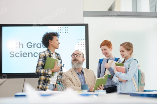 Preview: Group of Kids Talking to Teacher in School