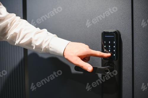 Preview: Businessman opening door using digital code panel security system