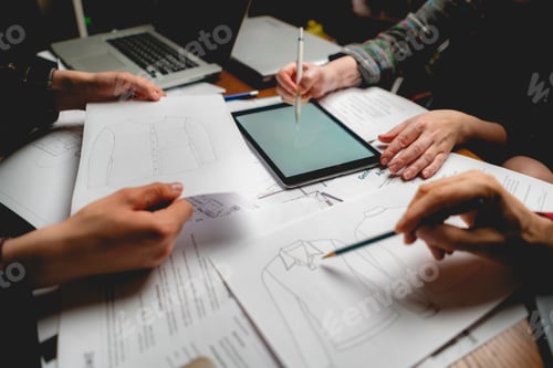 Preview: the process of group of people design new clothes on the paper