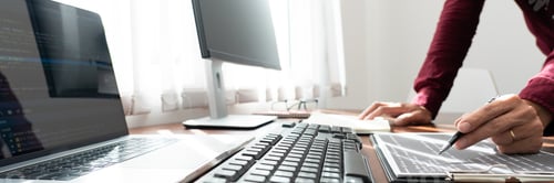 Preview: Software developer or programmer working data debugging improvement binary algorithm on desktop pc i