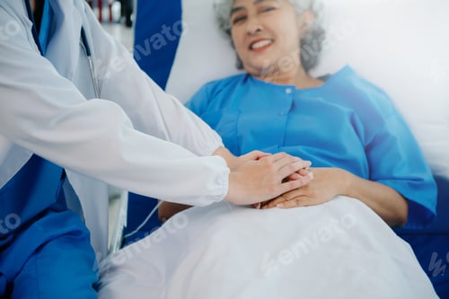 Preview: Caucasian doctor smiling take care of a young patient in hospital. Friendly nurse or therapeutic