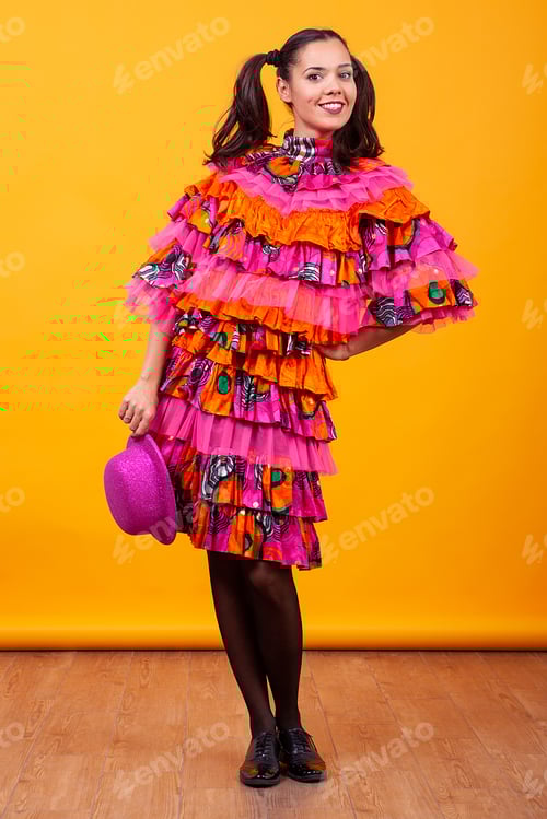 Preview: Young beautiful woman wearing a mascarade latino costume