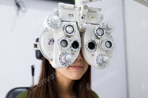 Preview: Young Woman doing eyesight test