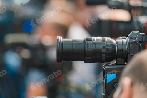 Preview: Camera at a Live Media Conference.