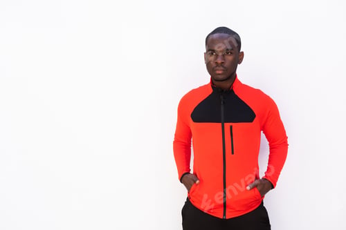 Preview: sporty african American man standing by white background