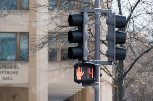 Crosswalk Signal with Hand and Countdown at College