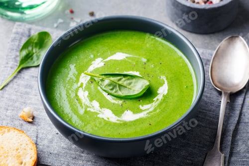 Preview: Spinach Soup with Cream in a Bowl. Close up.