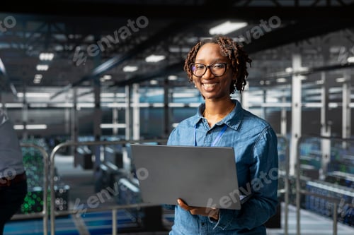 Preview: Portrait of black smiling technician monitoring AI LLM visualization