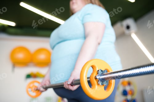 Preview: Overweight Woman Working Out with Barbell