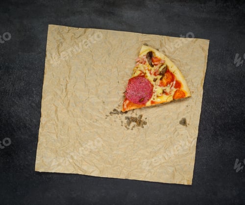 Preview: One Slice of Pizza on Dark Background