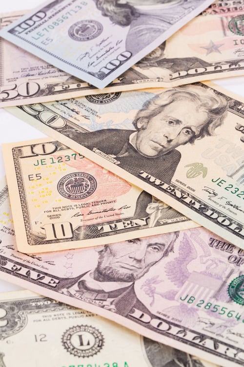 Preview: United States Currency Collection on White Surface