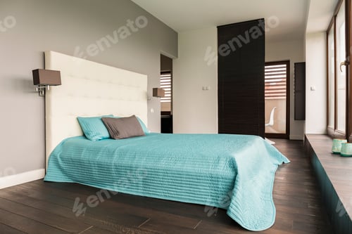 Preview: Grey bedroom with upholstered bed