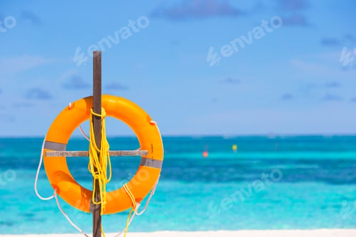 Preview: Lifebuoy ring on tropical white beach