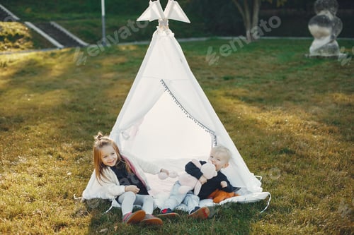 Preview: Family in a park playing on a grass