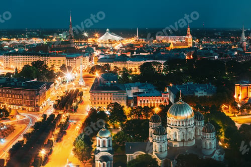 Preview: Riga, Latvia. Evening Night Aerial View Cityscape, Landmarks St. Peter's Church, Boulevard Of
