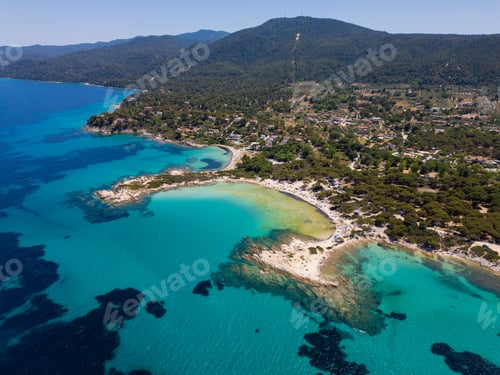 Preview: Aerial view of an island on Sithonia Peninsula, Greece, with beaches and rocks, surrounded by