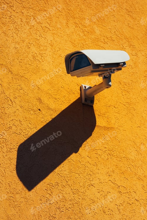Preview: Security camera on yellow wall