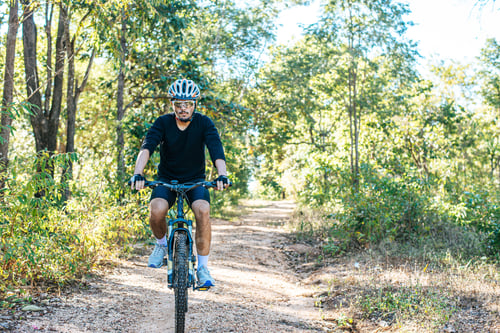 Preview: The man riding a bike in a mountain path