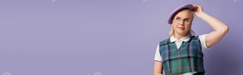 Preview: Student in uniform holding beret isolated on purple, banner