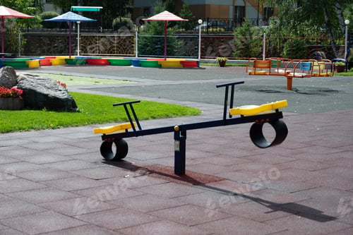 Preview: An image of a colorful playground, without children.