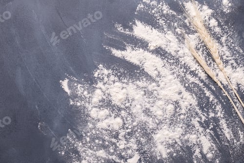 Preview: Baking or cooking background, flour on the dark background