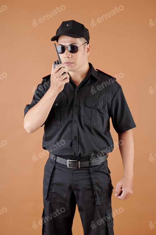 Preview: Police Officer Talking in Walkie-Talkie