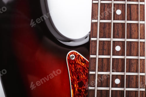 Preview: Metallic Volume Treble Guitar Bass Knobs. Electric Guitar. Red Electric Bass Guitar Close-Up