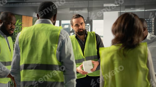 Preview: Colleagues in real estate and architecture working together on project design