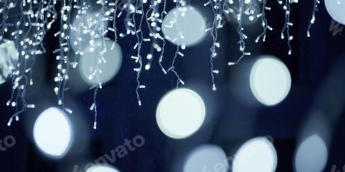 Preview: Blue lights bokeh from christmas holiday garlands, blurred festive background, abstract lights
