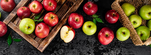 Preview: An assortment of red and green apples on the table.