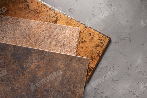 Preview: Tile samples at cement floor background texture. Concrete wall and tiles with