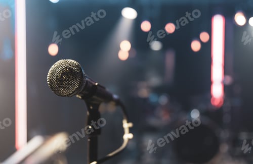 Preview: Close up microphone on blurred background with bokeh.