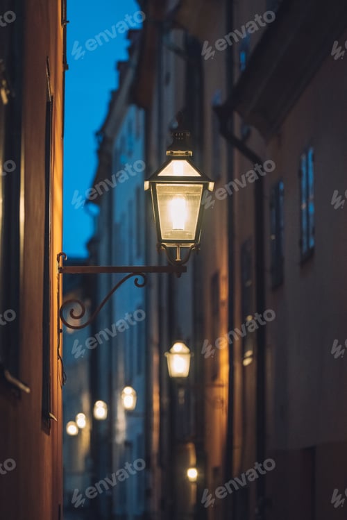 Preview: Bright lamp illuminates a narrow alley, creating a warm and inviting atmosphere