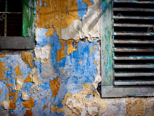 Preview: Sun-Drenched Textures and Peeling Paint Reveal the Passage of Time on a Weathered Wall