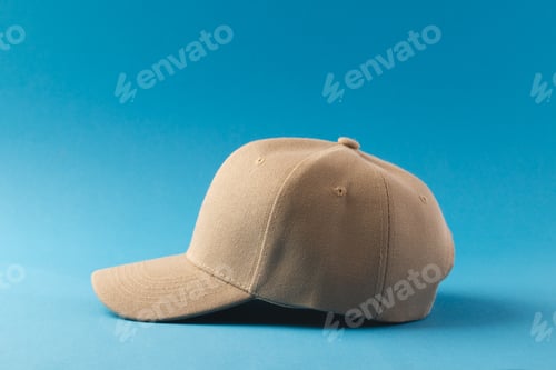 Preview: Cream baseball cap and copy space on blue background