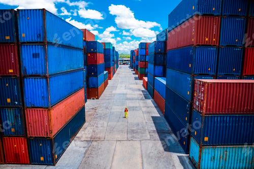 Preview: Arial view dock worker under inspection about dock container shipping warehouse ,he wearing safety u