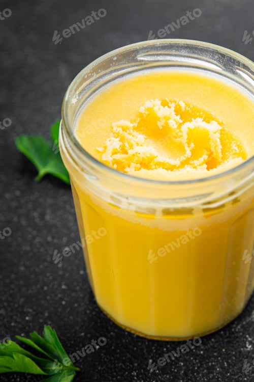 Preview: Ghee butter or clarified butter delicious gourmet food background on the table rustic food top view