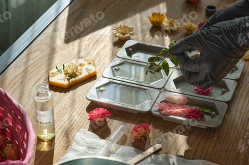 Preview: woman businesswoman creates a flavored wax tablet at home. creative profession.