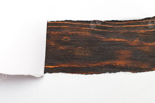 Preview: Tear paper on wooden background. copy space
