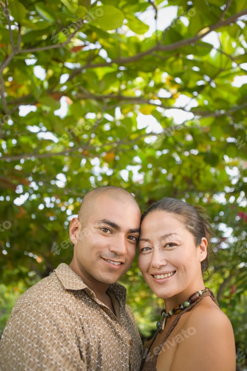 Preview: Couple posing for the camera outdoors